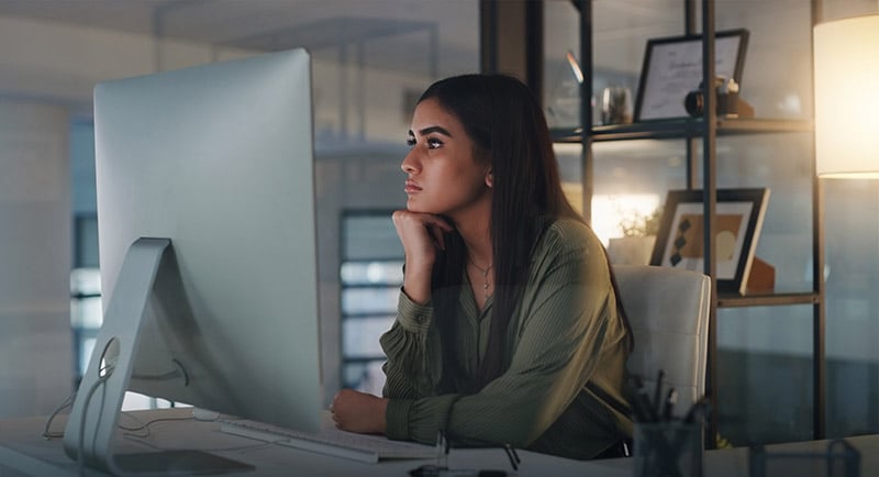 Woman looking at her monitor