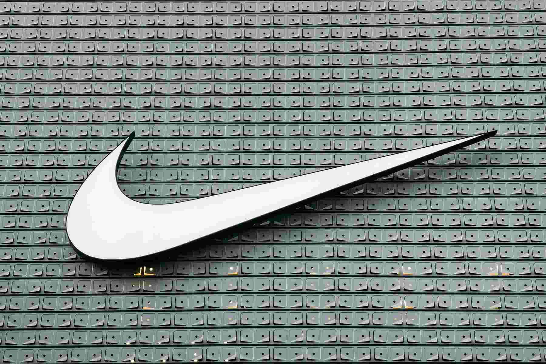 A big Nike icon on the store building
