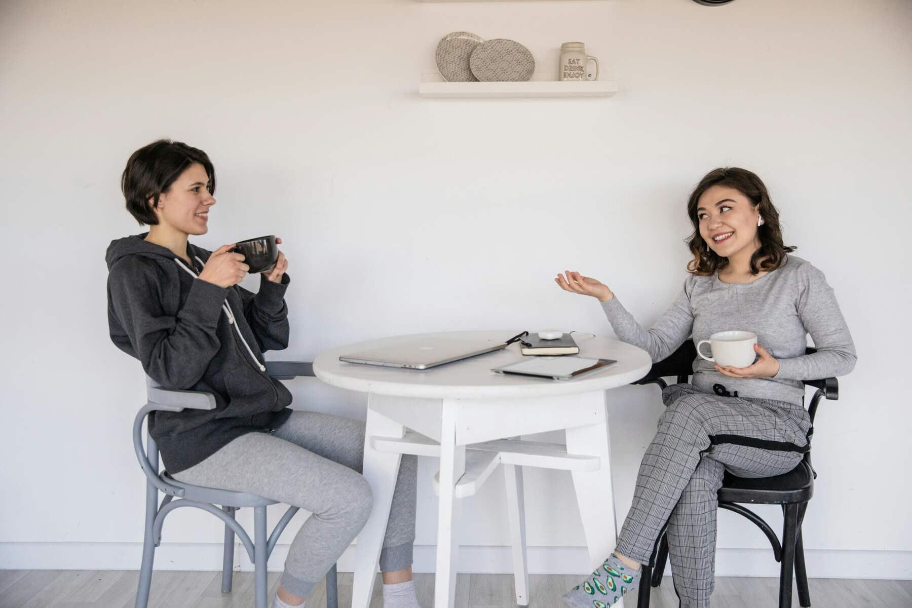 Two women having coffee together