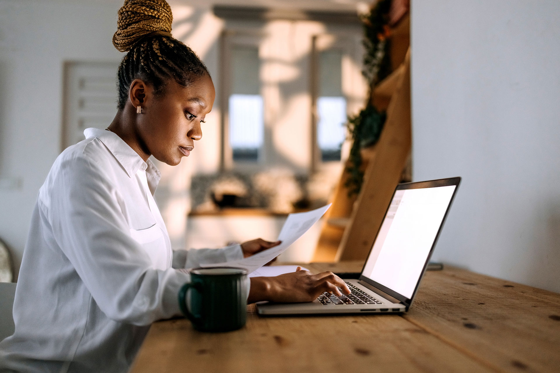 Busy businesswoman working from home