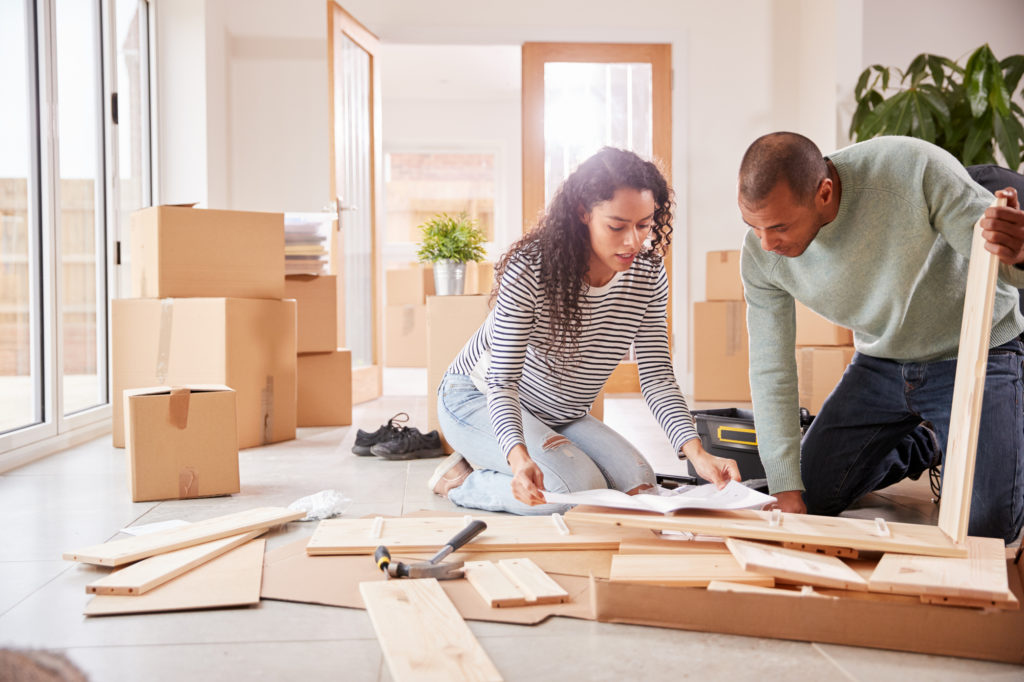 A couple making home modifications on their own to save money.