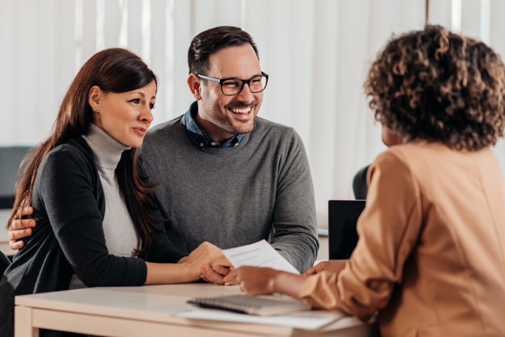 husband and wife meeting with banker