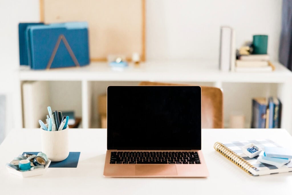 laptop on desk in office for article how working from home changed my life